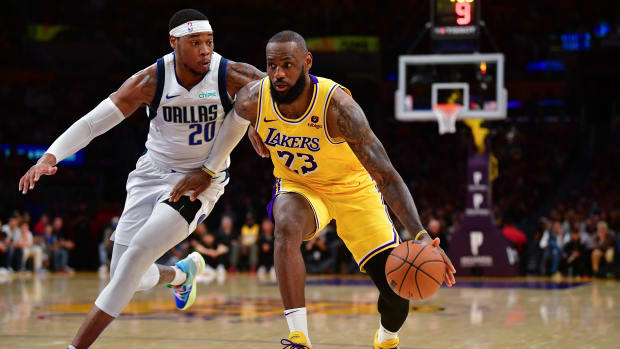 Richaun Holmes guards LeBron James.